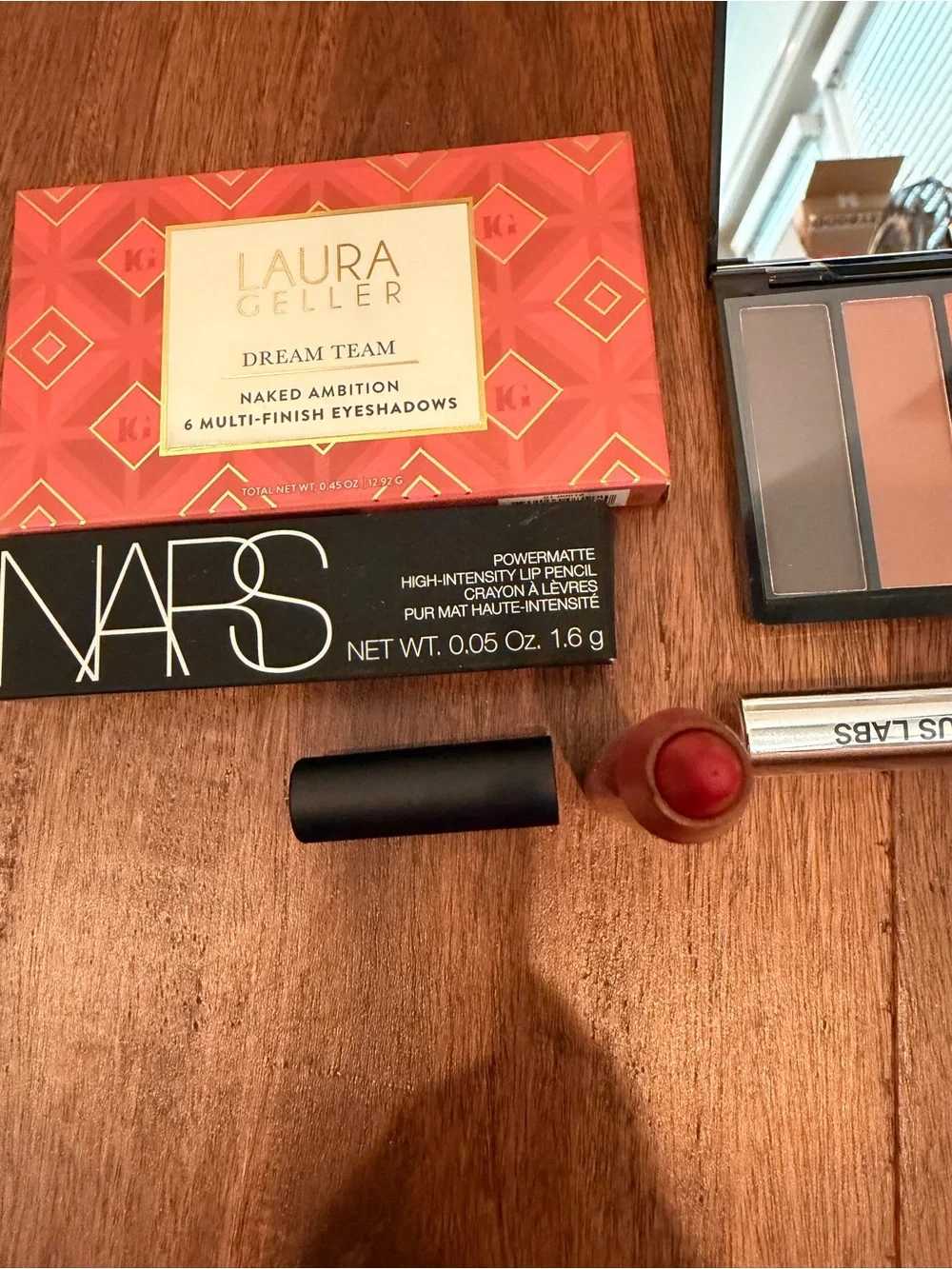 Laura Geller shadow palette, nars lip, Laura Geller gloss, haus mascara
